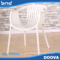 Outdoor design arm dining chairs in restaurant